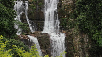 Fototapeta na wymiar Waterfall background by @s2003h
