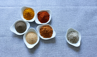 Set of spices for cooking meat dishes, close-up. 