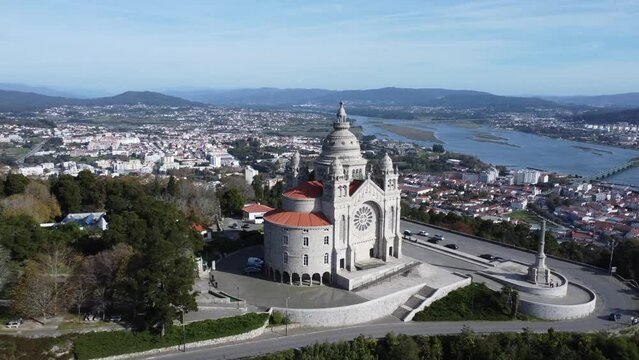 Breathtaking drone view of the castle above the town of viana do castelo in portugal, sun!
