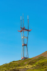patrial sutro tower with grassy hillside foreground
