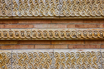 Limestone detail work on wall straight on