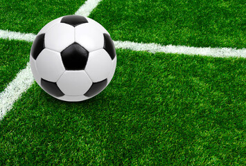 Obraz na płótnie Canvas Soccer ball on stadium field texture