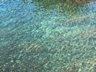 Water sea with turquoise clear surface in paradise bay, beautiful seascape.