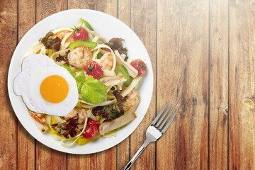 Tasty fresh noodle dish with egg