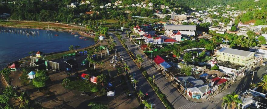The maritime city of Santa Barbara de Samana on the coast of the Atlantic Ocean. Humpback Whale Resort. Dominican province from a bird's eye view. Landscape of the evening city, view from above.
