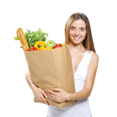 Young woman holding a shopping bag full of groceries