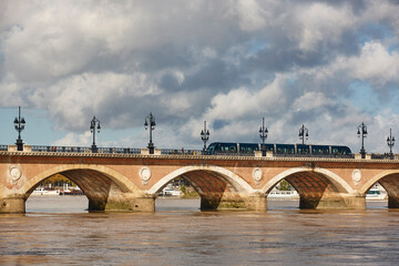 Garonne river and Pont de Pierre bridge. Transport. Bordeaux ,France