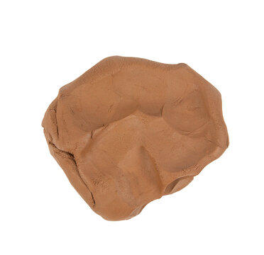 Natural clay piece isolated on white background. Wet clay material for sculpting or modeling.