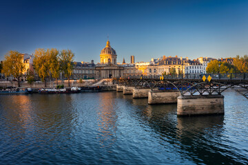 Cityscape of Paris by the Seine river at sunrise. France