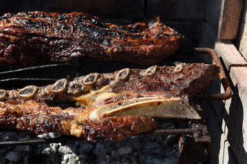 Barbecue, grilled sausages and cow meat , traditional argentine cuisine