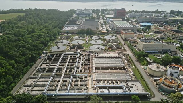 Sewage Treatment Plant in Tai Po, Sludge Digestion Facility in aerial view. Primary and Final Sedimentation.