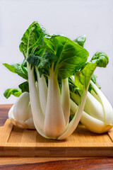 Young organic white bok choy or bak choi Chinese cabbage ready to cook