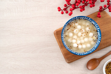 Little white tangyuan with sweet osmanthus honey and syrup soup.