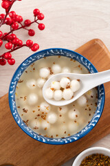 Little white tangyuan with sweet osmanthus honey and syrup soup.