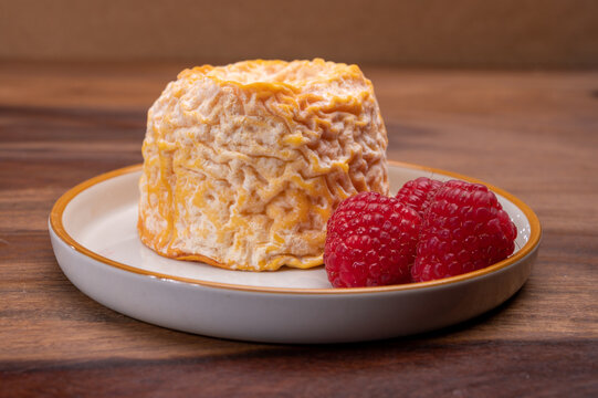 French Langres soft cows crumbly cheese with washed rind structure made in Champagne - Ardenne region
