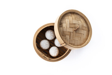 Steamed dumplings and soy sauce isolated on white background. Top view