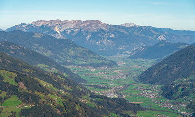 Zillertal Alpine valley in Austrian Alps viewed from the top of Gerlosstein on a sunny day of autumn.
