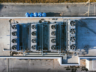 Aerial top down view of air conditioning system on the roof.