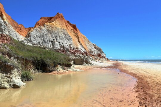 Colorful beach and hill of Morro Branco in Ceara State, Brazil. 