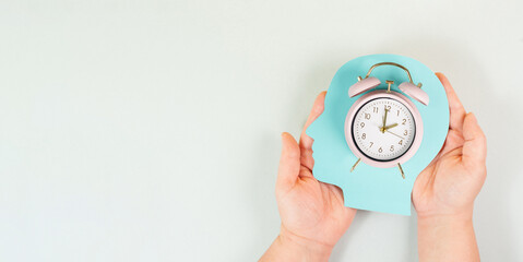 Head with alarm clock, time pressure and management in business, having a deadline or appointment, efficiency planning
