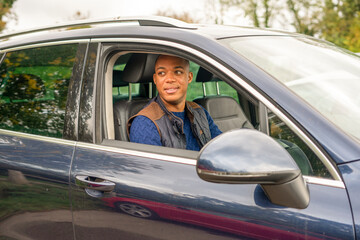 Man sitting in car