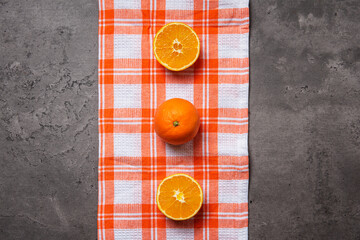 oranges on checkered cloth