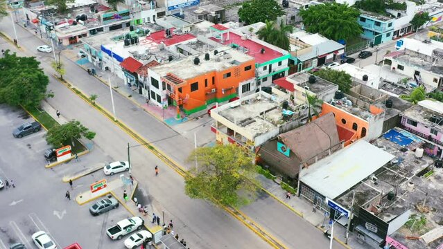 aerial cityscape of colorful buildings on downtown street in Playa del Carmen town in Mexico