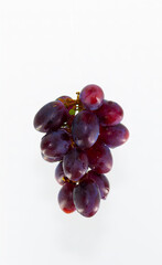 Blue grapes for dessert with a cup of coffee