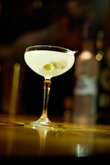 Martini Glass with Green Olives