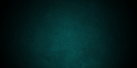 Dark green background with grunge backdrop texture, watercolor painted mottled green background, colorful bright ink and watercolor textures on black paper background. 