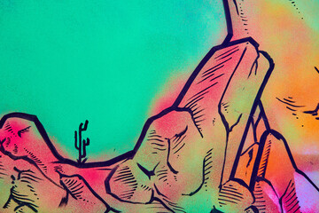 Desert artwork with green and warm glowing colors and cactus