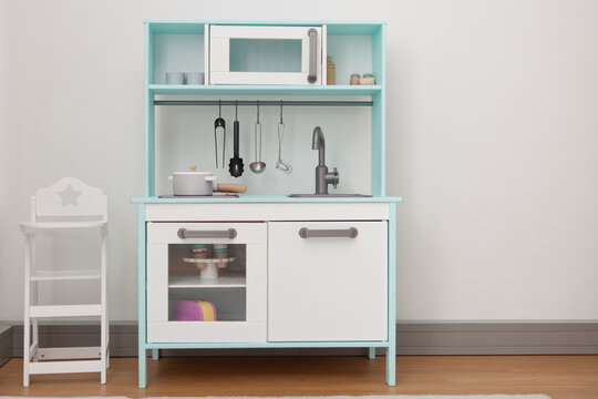 wooden kitchen for kid- toy for young children. play cook at home or daycare. Game Toddler