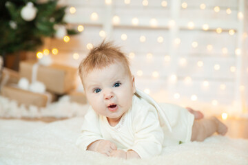Cute adorable   child on warm white fur