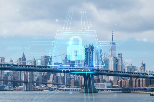 Brooklyn and Manhattan bridges with New York City financial downtown skyline panorama at day time over East River. The concept of cyber security to protect confidential information, padlock hologram