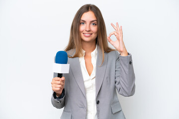 Fototapeta premium Young TV presenter caucasian woman isolated on white background showing ok sign with fingers