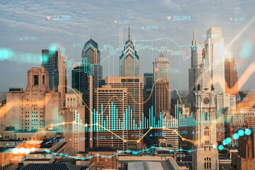 Aerial panoramic cityscape of Philadelphia financial downtown, Pennsylvania, USA. City Hall Clock Tower, sunrise. Forex candlesticks and bar graph hologram. The concept of internet trading, brokerage