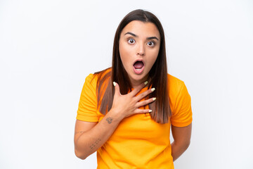 Young caucasian woman isolated on white background surprised and shocked while looking right