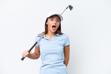 Young caucasian woman playing golf isolated on white background with surprise facial expression