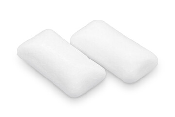 Three pieces of white chewing gum isolated on white. The whole subject is in focus.