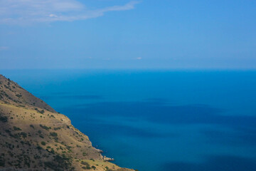 Fototapeta na wymiar Coast of the black sea in the Crimea in summer. Mountions.