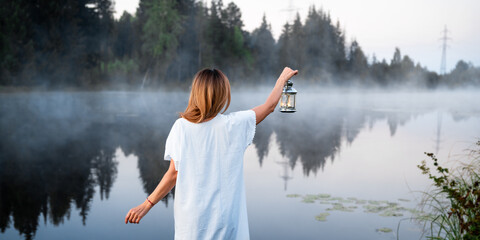 Woman by the lake © Azovsky