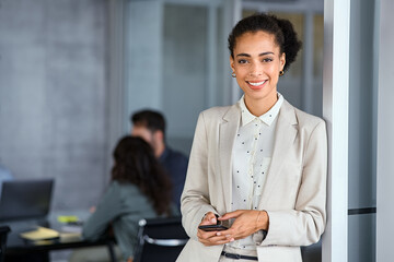 Successful mixed race business woman in office
