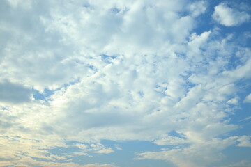 Blue sky with floating cloud