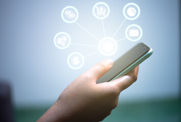 Woman using mobile phone for online shopping