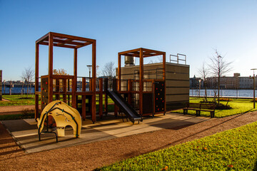 Fototapeta na wymiar Playground made of wood of a modern residential building