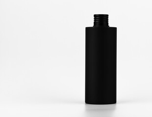 unbranded black plastic flacon for cosmetics products mockup. skincare and cosmetology branding...