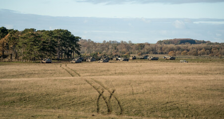 a squadron of British army FV4034 Challenger 2 ii main battle tanks on a military combat exercise,...