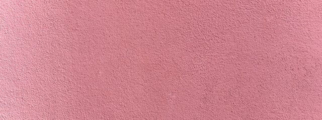 Cement wall with pink color texture background well editing montage text presentation or banner backdrop