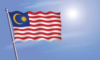 Malaysia flag against a blue sky