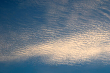 Clouds at sunset, amazing sky, nature background